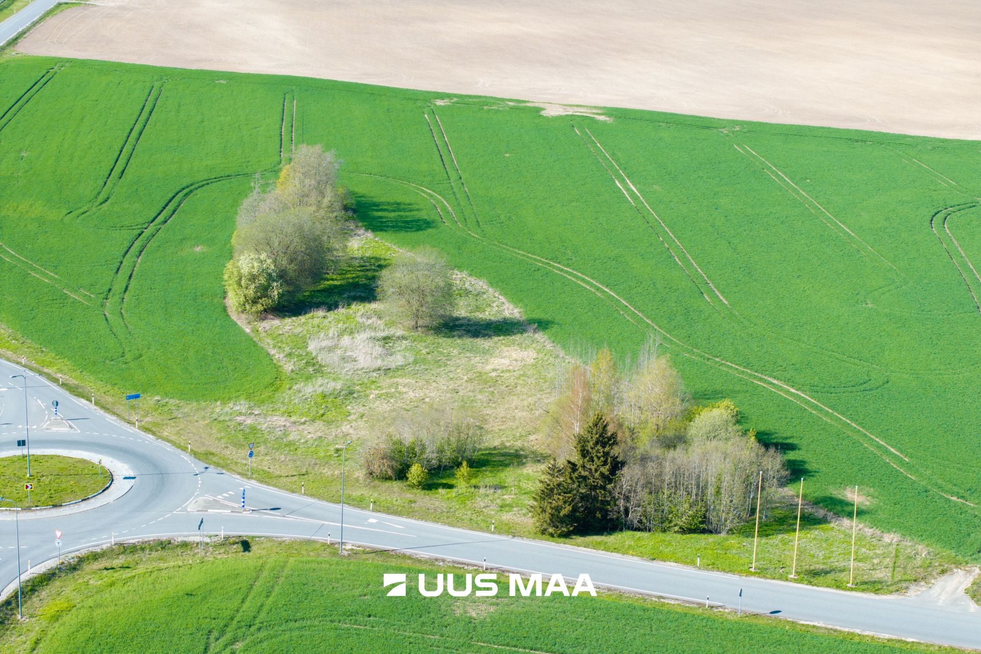 Uus Maa Pluss