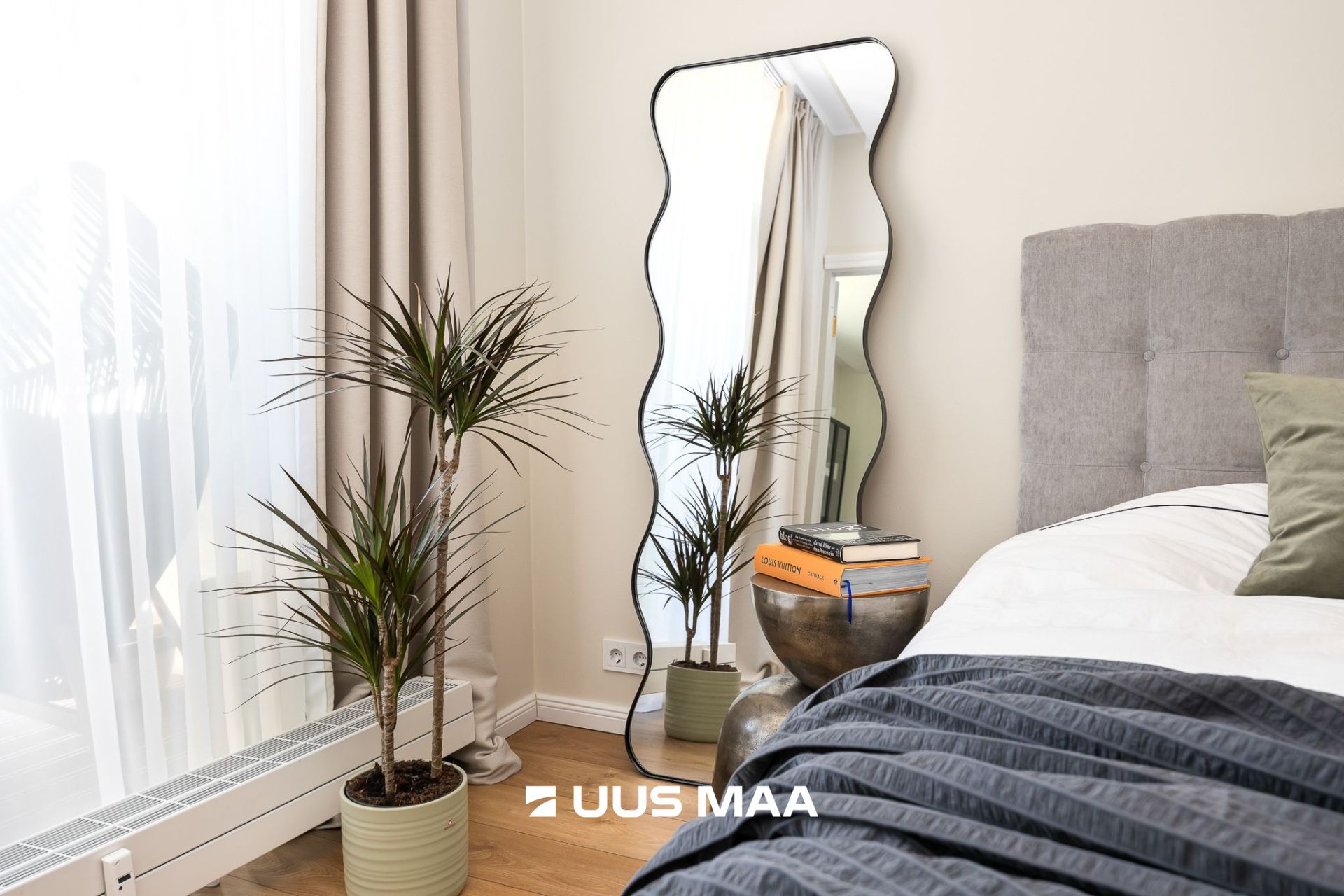 Uus Maa Pluss