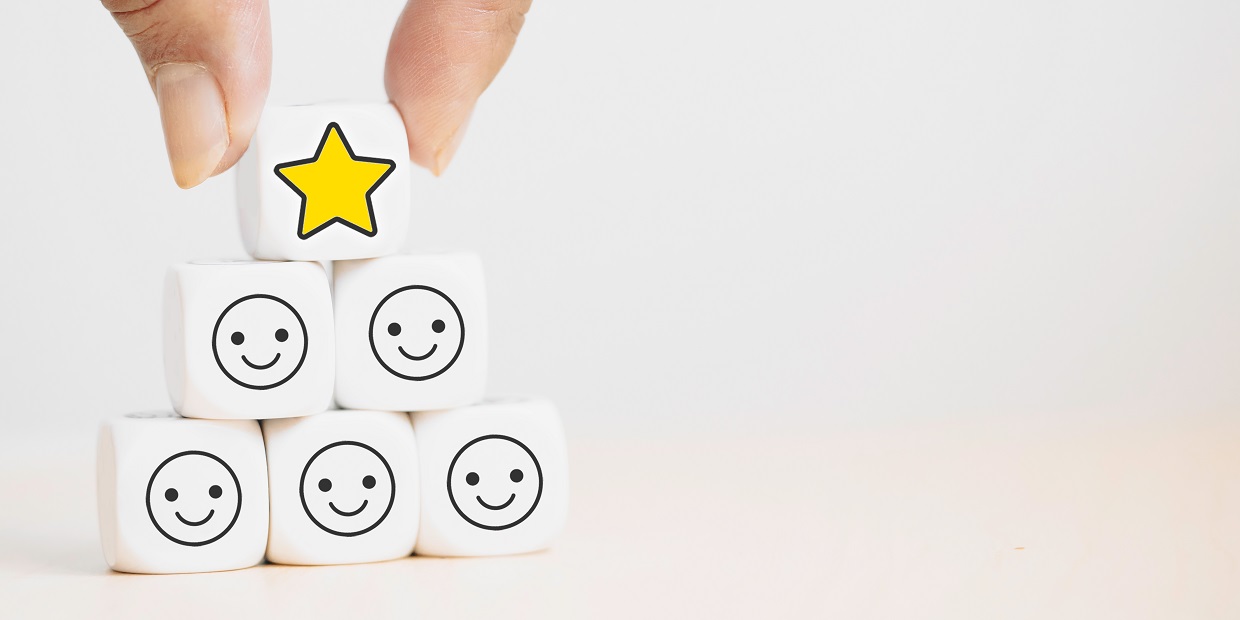 Hand,Putting,Dice,Cube,With,Icon,Face,Smiley,Feedback,,Best